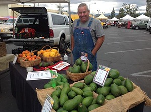 Brian Griffith of Griffith Family Farm in Riverside, CA selling his fruits and vegetables. Image courtesy of Brian Griffith.